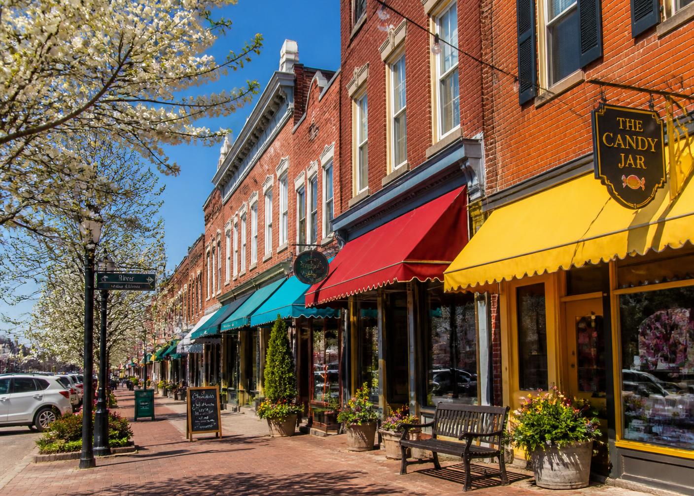Colorful historic main street storefronts in spring